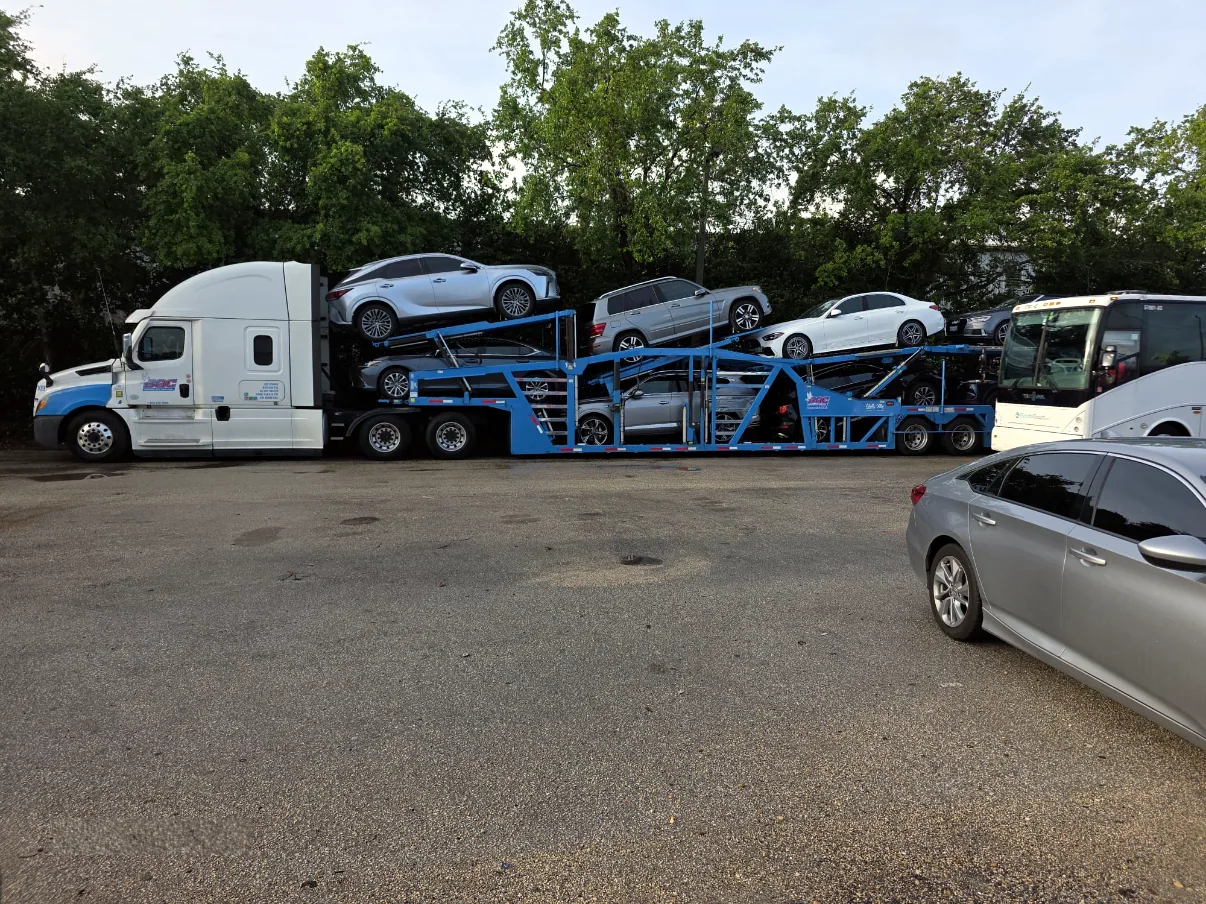 SAC open car carrier loaded with vehicles, Toronto-area car shipping